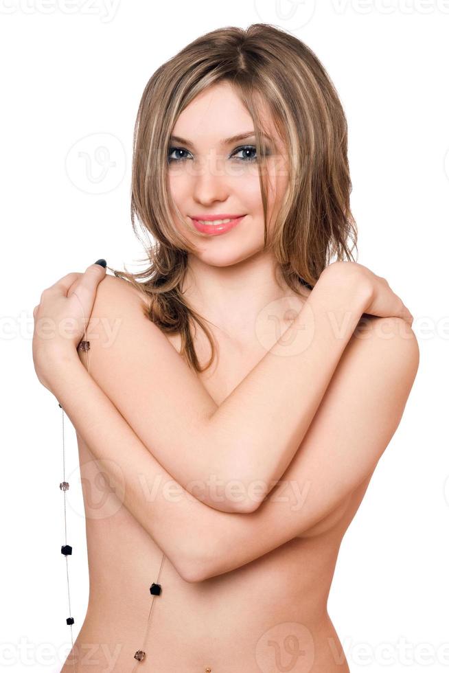 Porträt einer lächelnden nackten jungen Frau foto