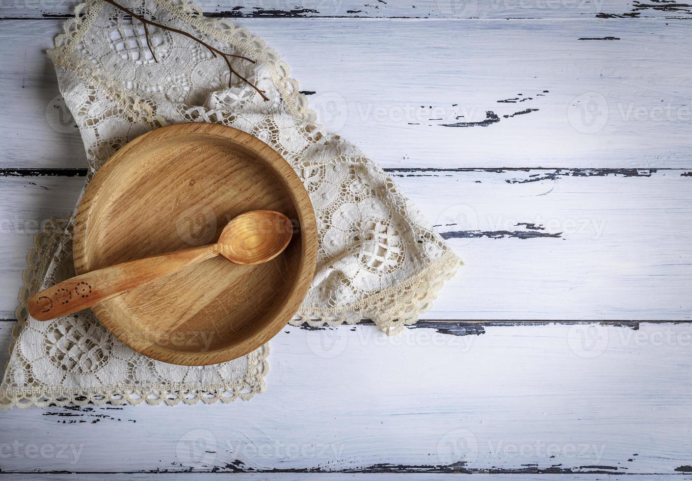 Holzschale und Löffel foto