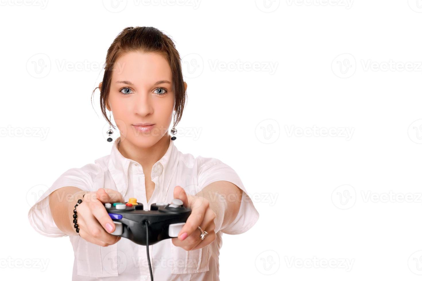 junge Brünette Mädchen mit einem Joystick foto