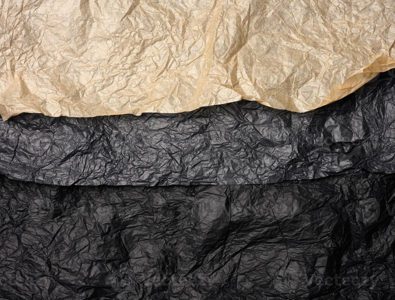 zerknittertes schwarzes und braunes Papier, abstrakter Texturhintergrund foto