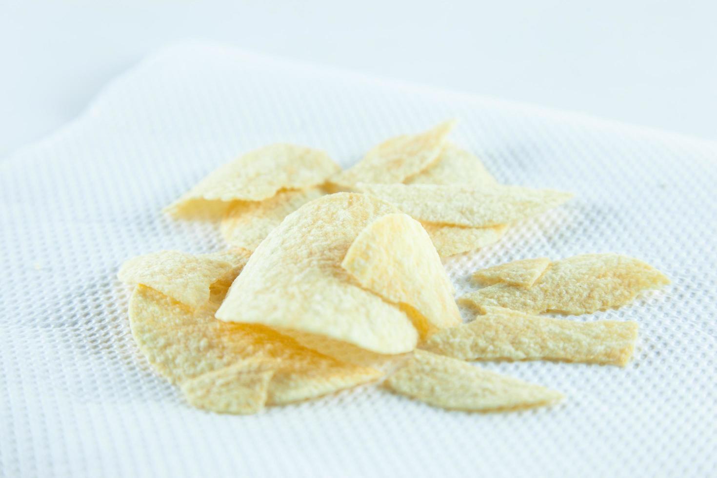 Kartoffelchips auf Taschentuch foto