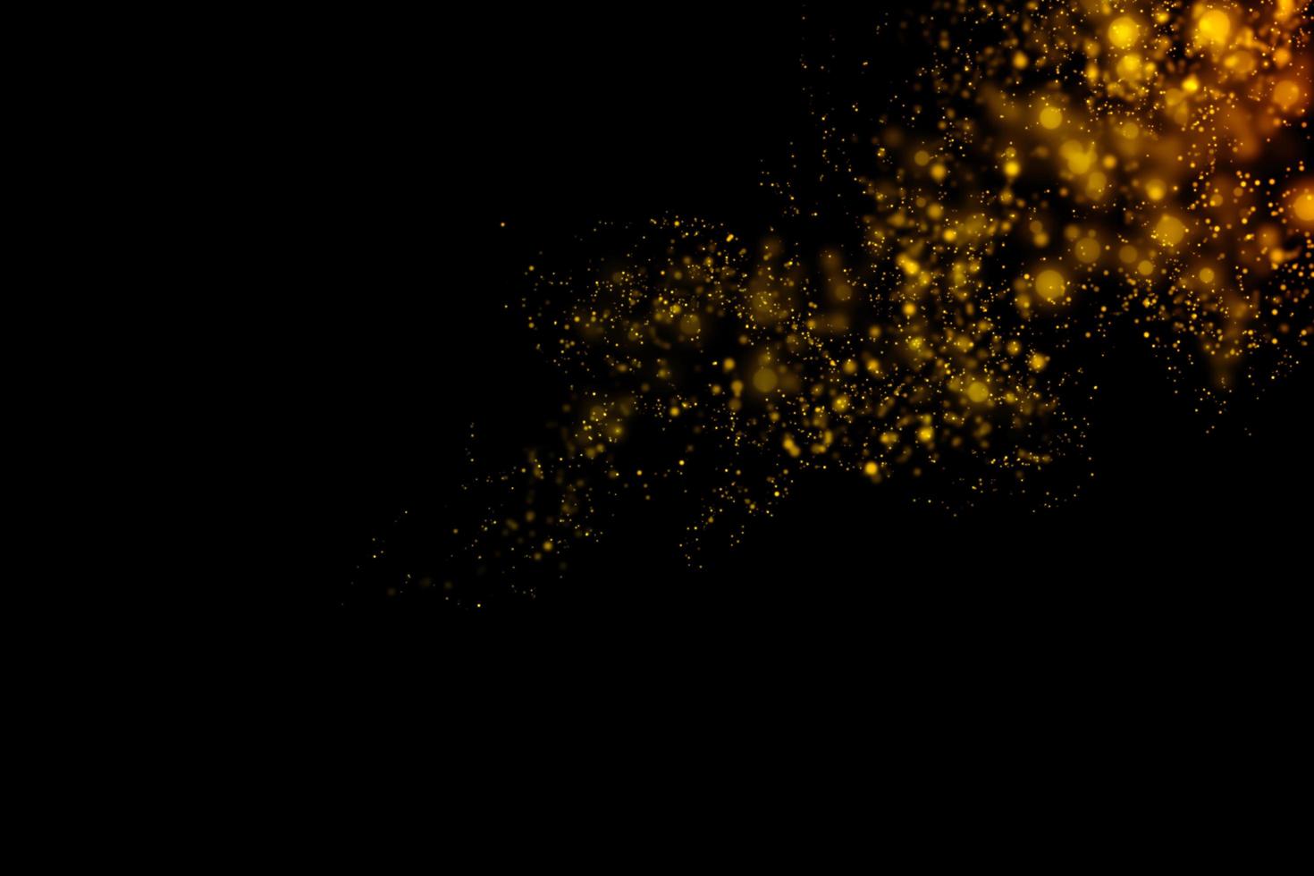 verschwommene goldene Kreise auf schwarzem Hintergrund foto