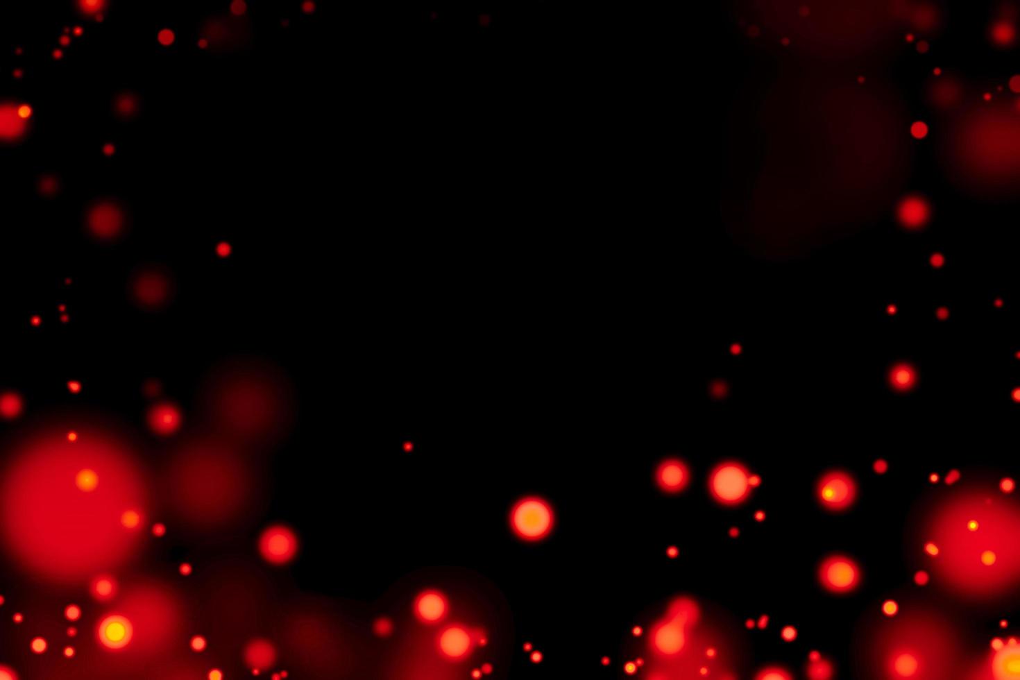 verschwommene rote Kreise mit schwarzem Hintergrund foto