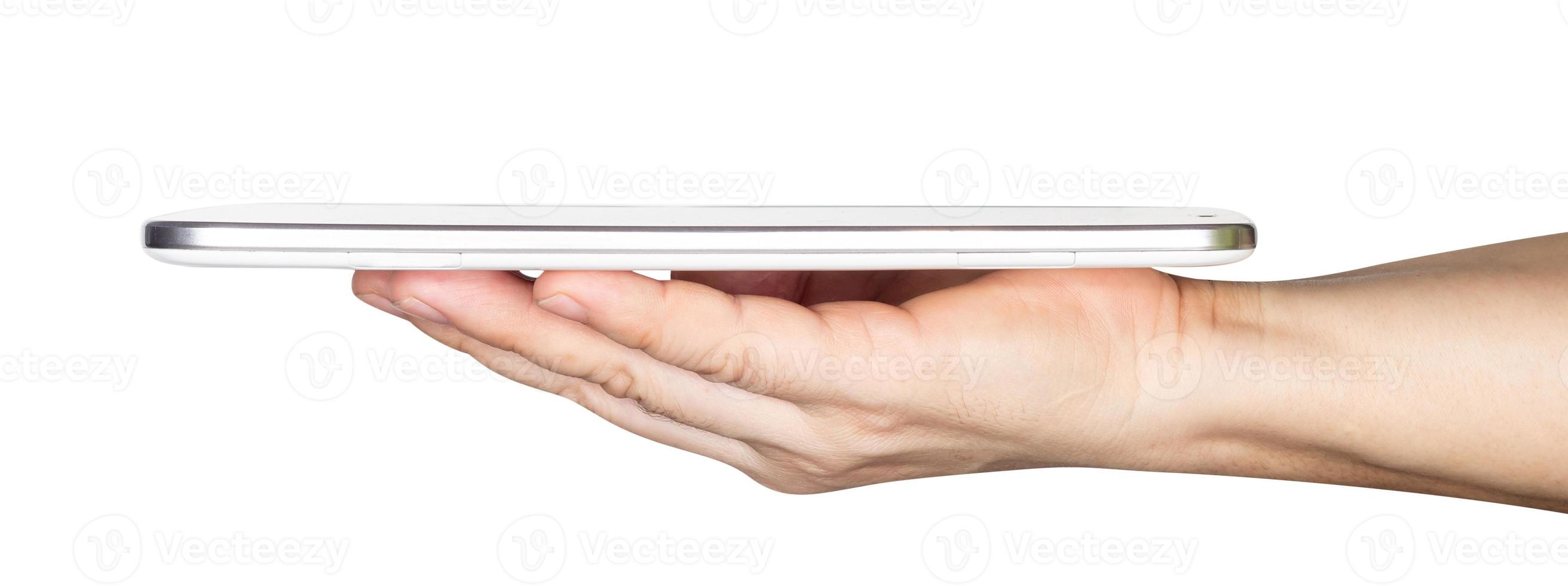 Geschäftsmannhand, die den weißen Tablet-Computer lokalisiert auf weißem Hintergrund hält, schließen Beschneidungspfad ein foto