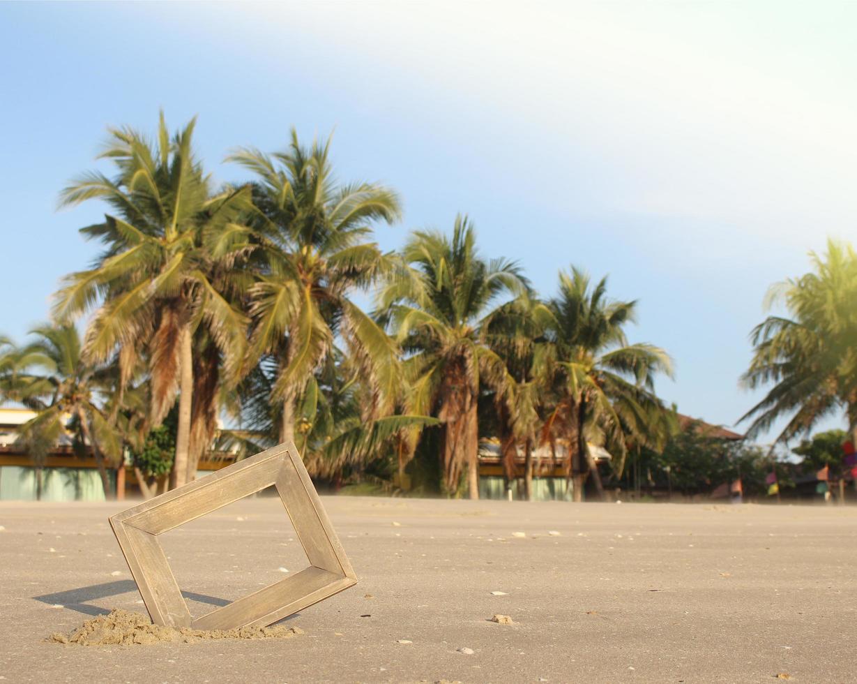 Fotorahmen im Sand am Strand foto