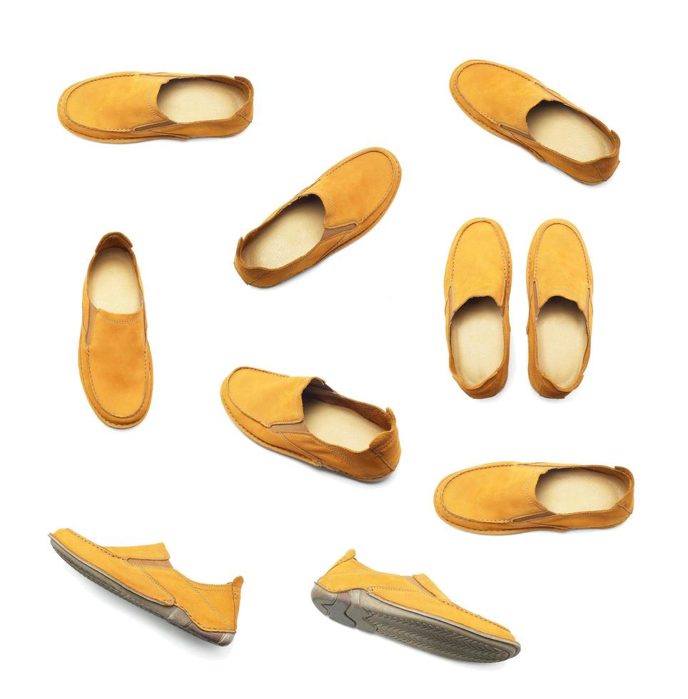 Satz gelbe Schuhe auf Weiß foto