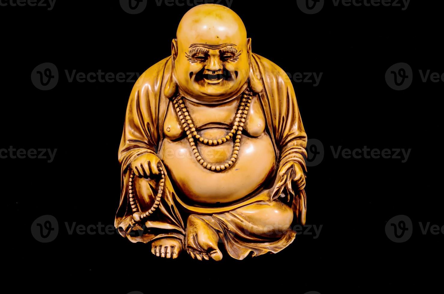 Buddha auf schwarzem Hintergrund foto