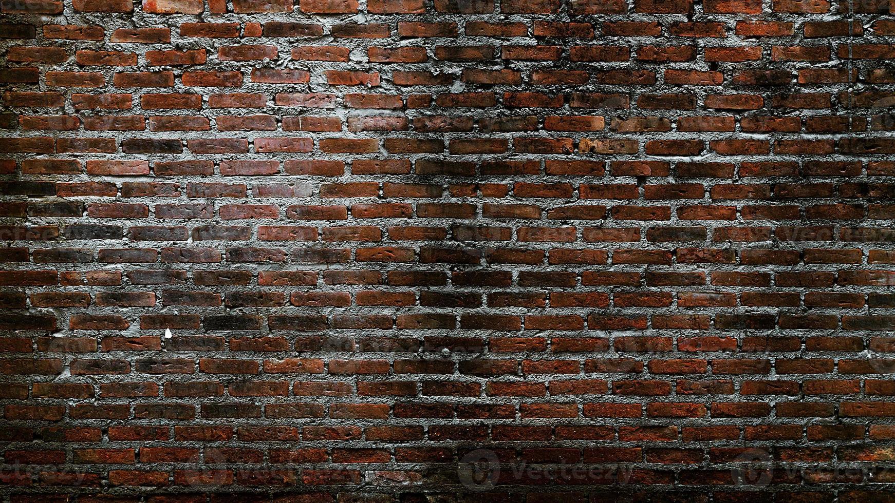 Backstein Mauer Jahrgang Hintergrund, alt Backstein Wand, dekorativ dunkel Backstein Mauer Oberfläche zum Hintergrund foto