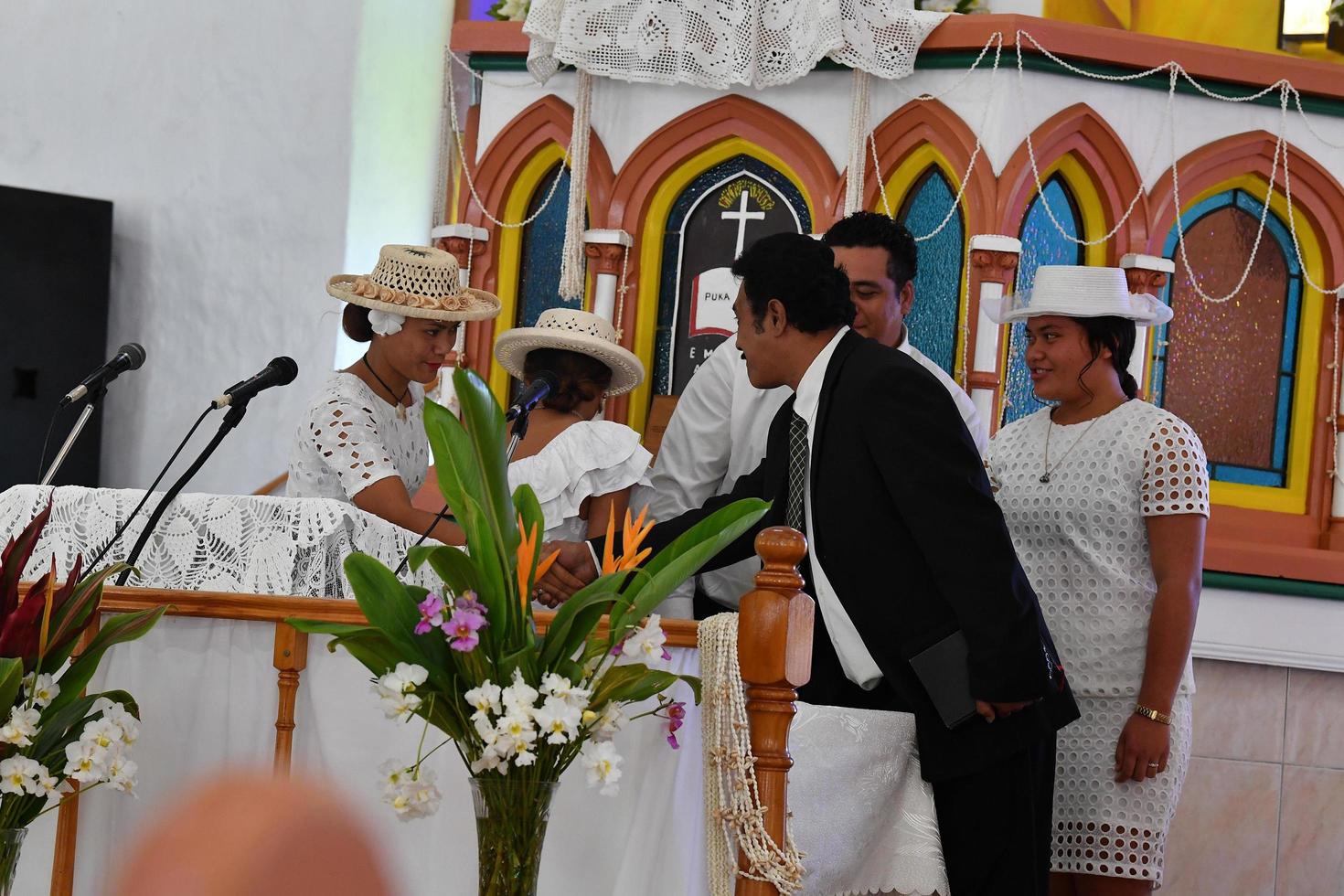 Aitutaki, Cookinsel - 27. August 2017 - Einheimische bei der Messe foto