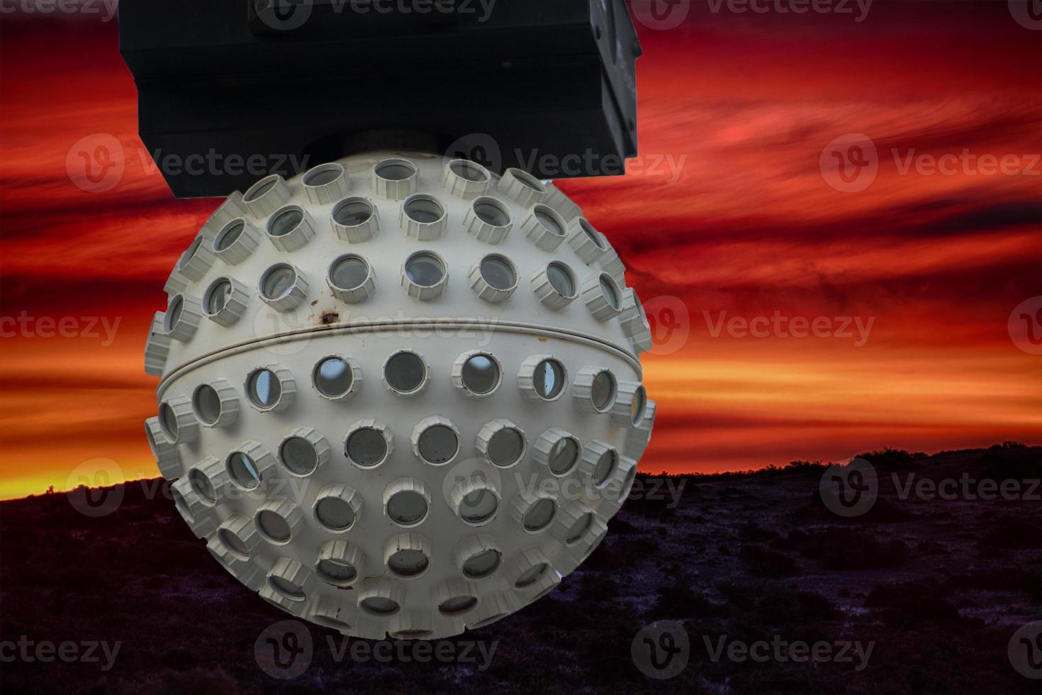 Licht rotierend Ball auf Hölle Hintergrund foto