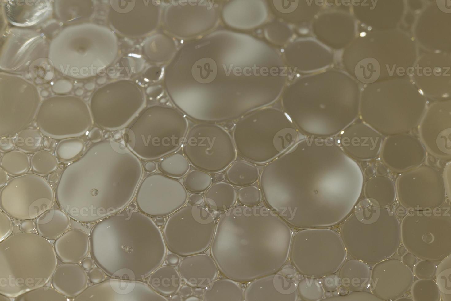 Makroaufnahme von Olivenöl in Wasser gemischt foto