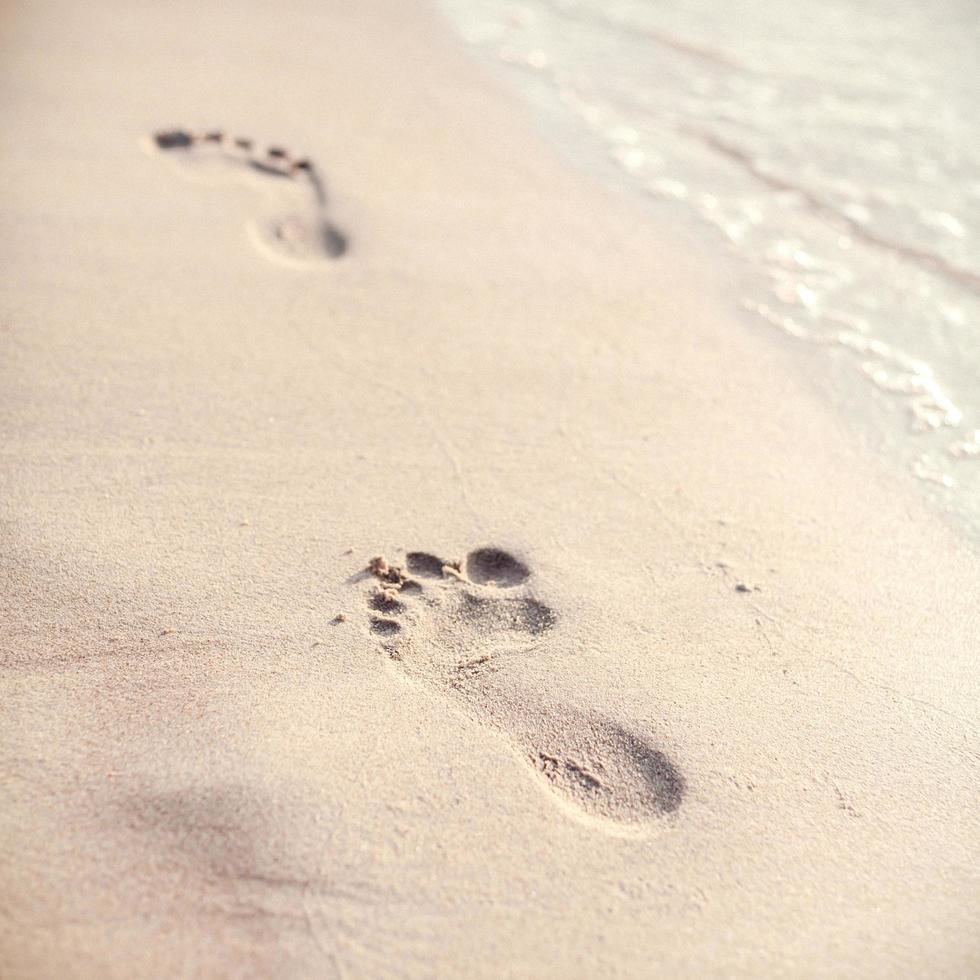 Fußspuren im Sand foto