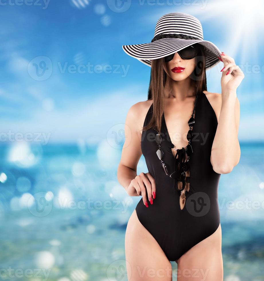 Frau auf Luxus Badeanzug foto