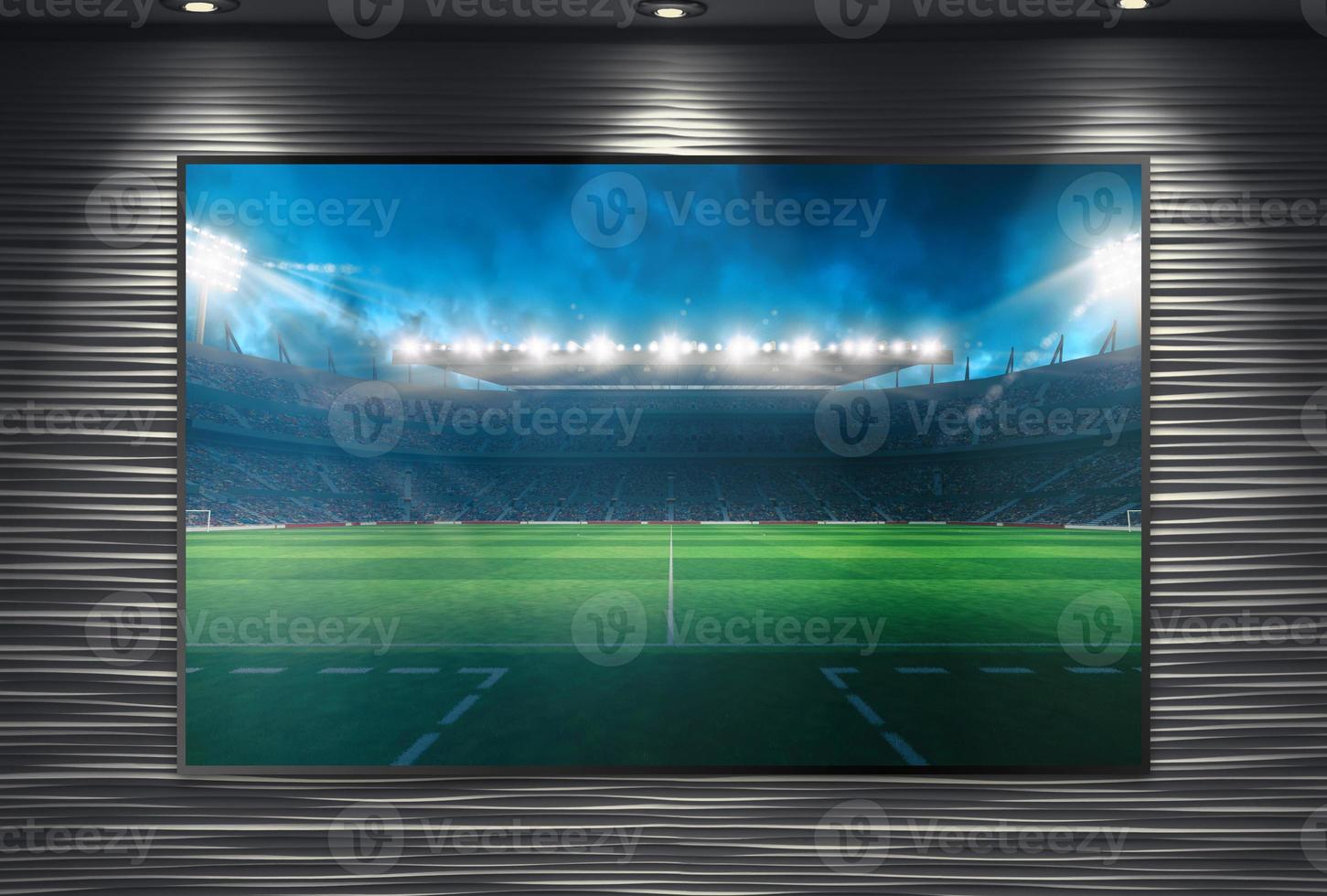 Aufpassen ein Fußball Veranstaltung auf ein groß Fernseher Mauer montiert und beleuchtet durch Scheinwerfer foto