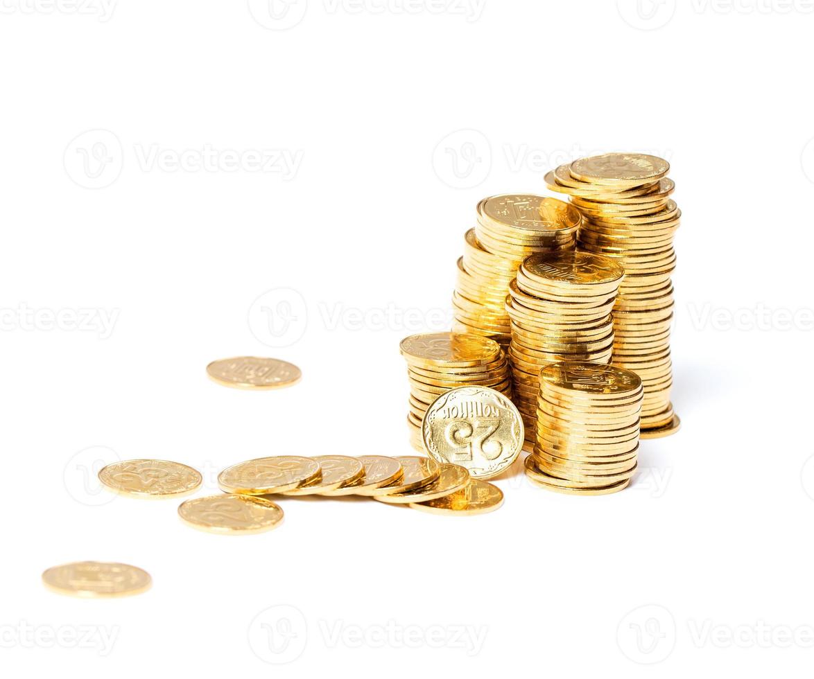 das golden Münzen auf Weiß foto