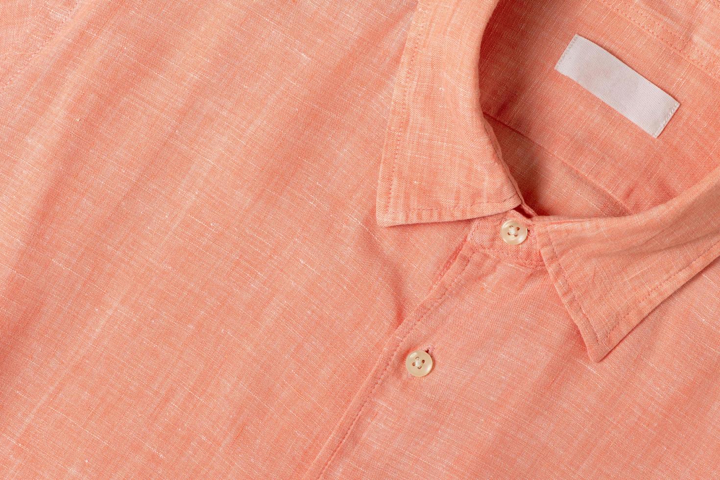 Orange Baumwolle Leinen- Shirt, Textil- Stoff Konzept foto