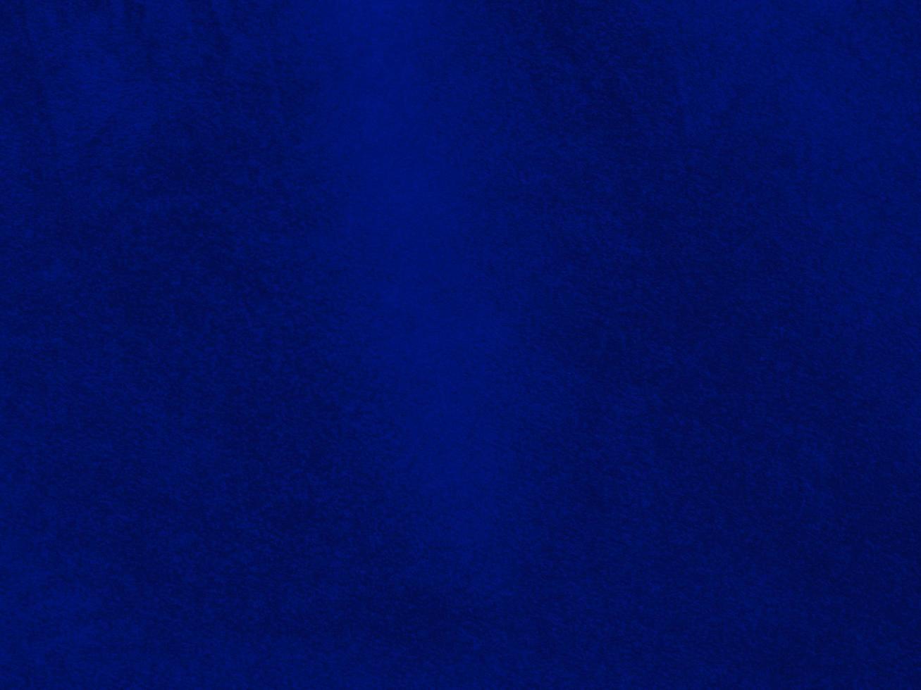 blaue Samtgewebestruktur als Hintergrund verwendet. leerer blauer Stoffhintergrund aus weichem und glattem Textilmaterial. Es gibt Platz für Text. foto