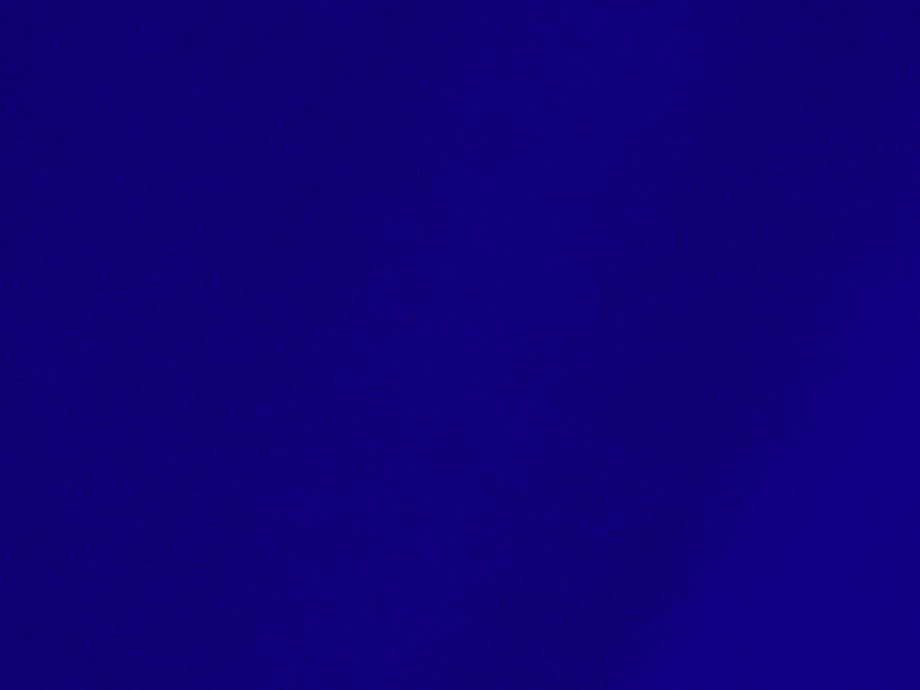 blaue Samtgewebestruktur als Hintergrund verwendet. leerer blauer Stoffhintergrund aus weichem und glattem Textilmaterial. Es gibt Platz für Text. foto
