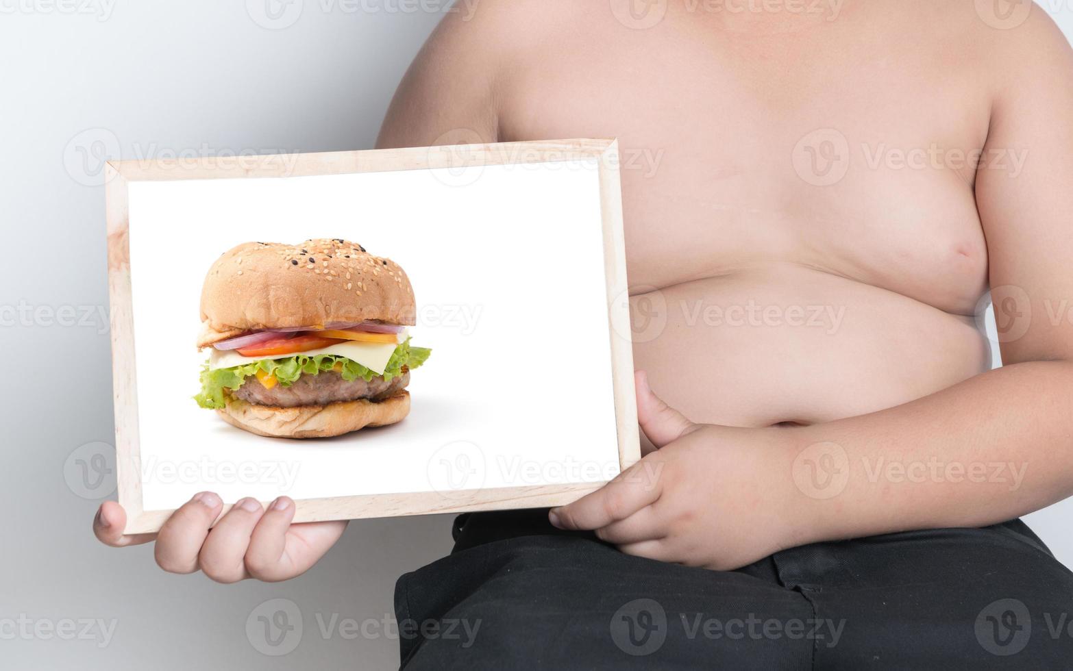 Fett Junge Show Hamburger Bild auf Whiteboard foto