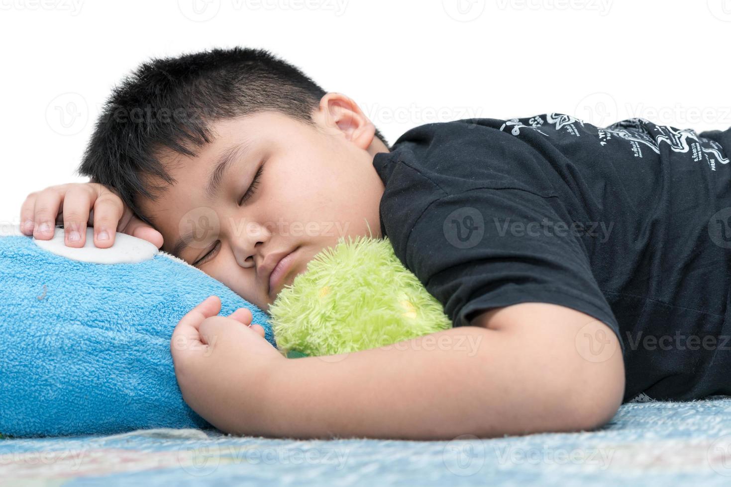 Fett Junge Schlaf isoliert auf Weiß foto