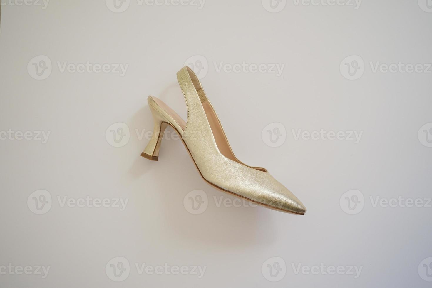 golden elegant Frau Schuh ein Schuhwerk Mode Stil foto