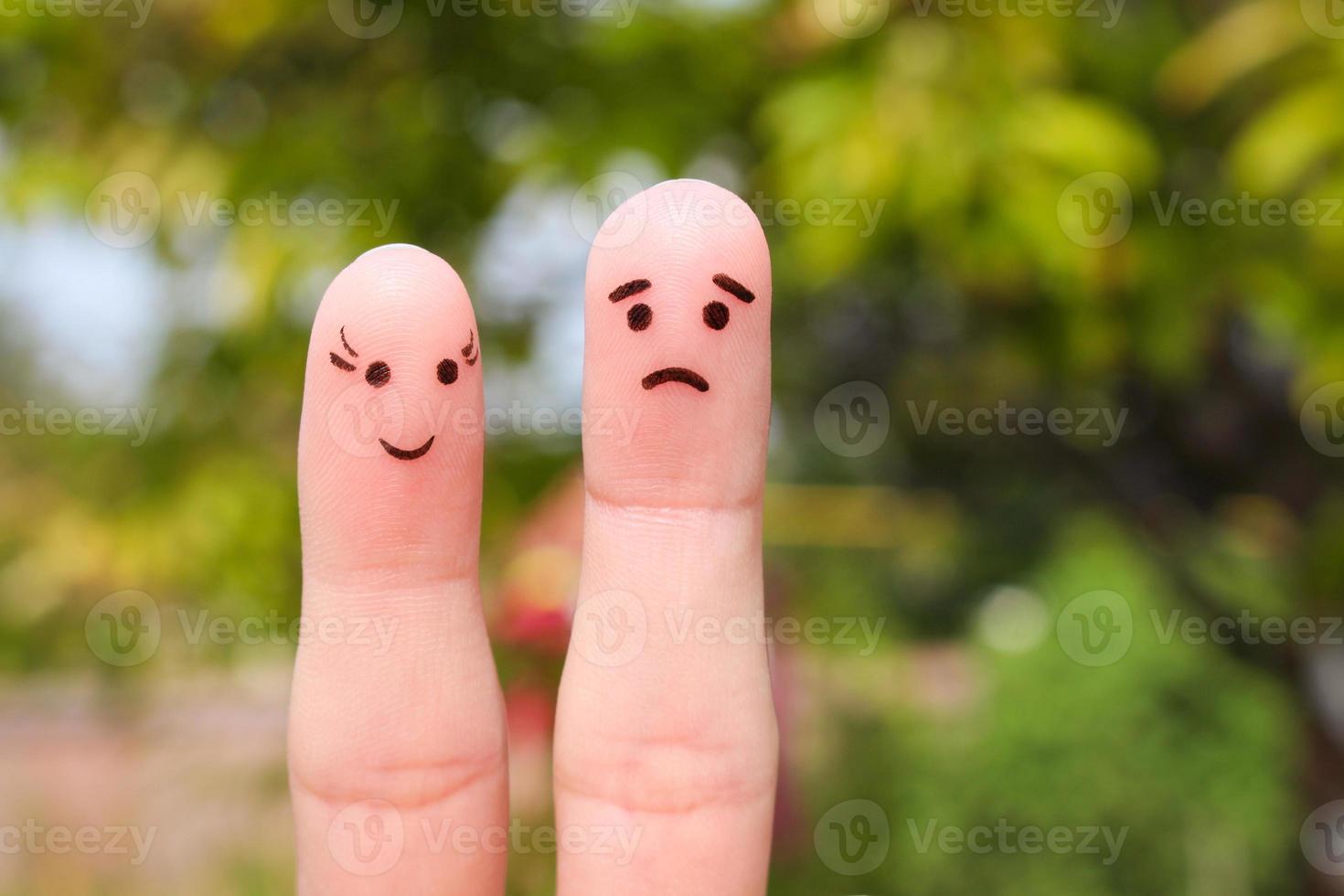 Finger Kunst von Paar. Frau ist heiter, Mann ist traurig. foto