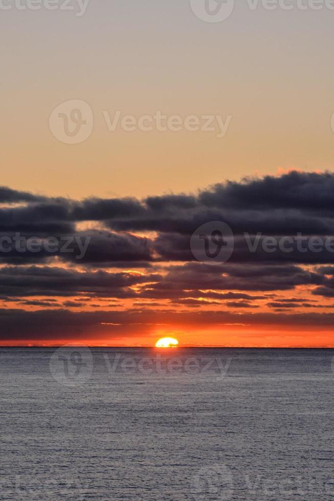 Sonnenuntergang an der Küste foto