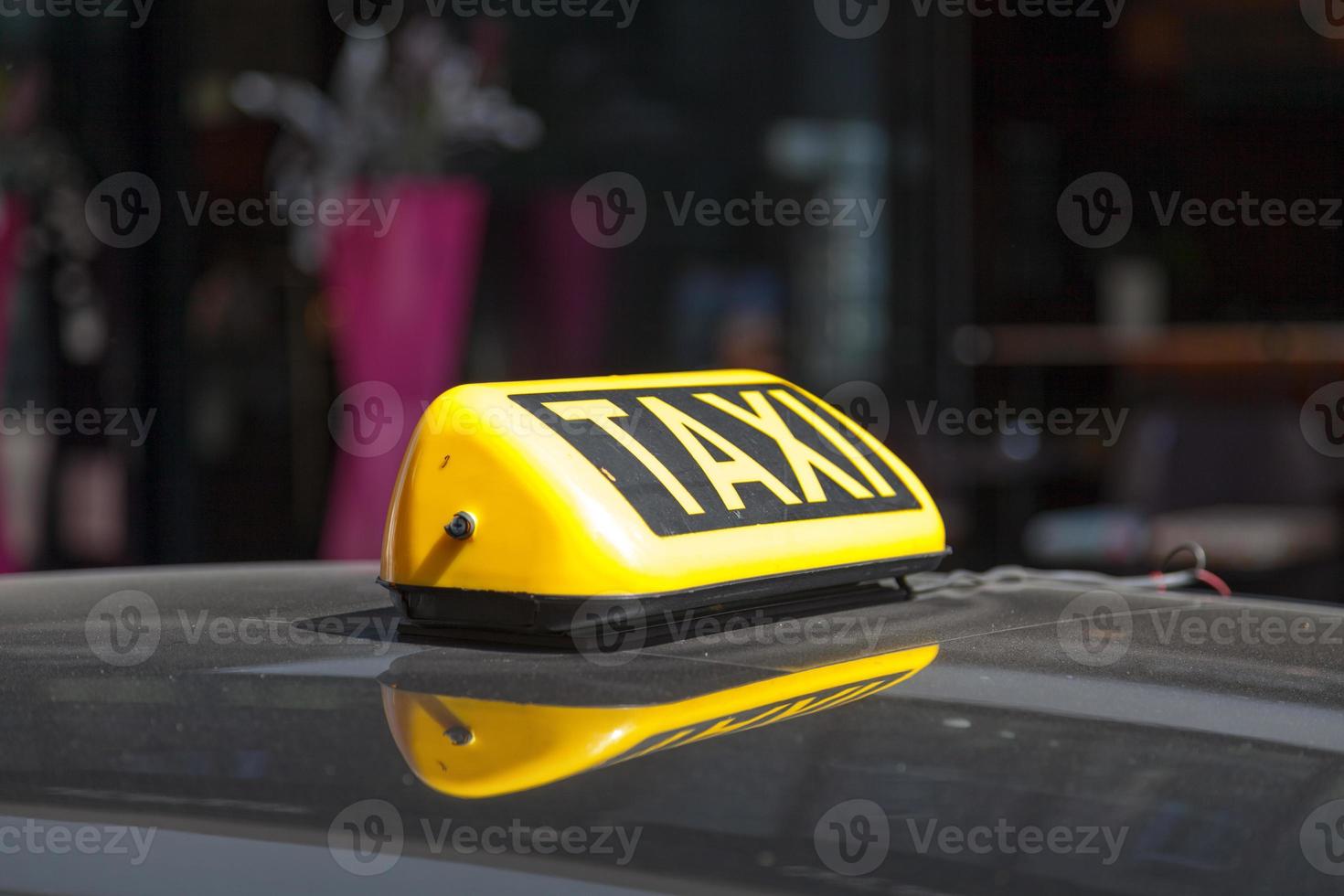 Gelb österreichisch Taxi Zeichen foto