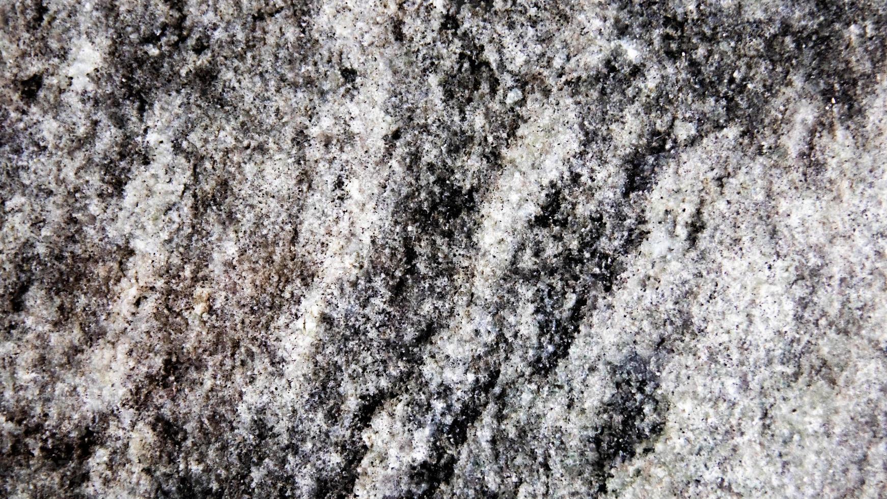 schließen oben von Granit Textur zum Hintergrund. schwarz und Weiß Ton. foto