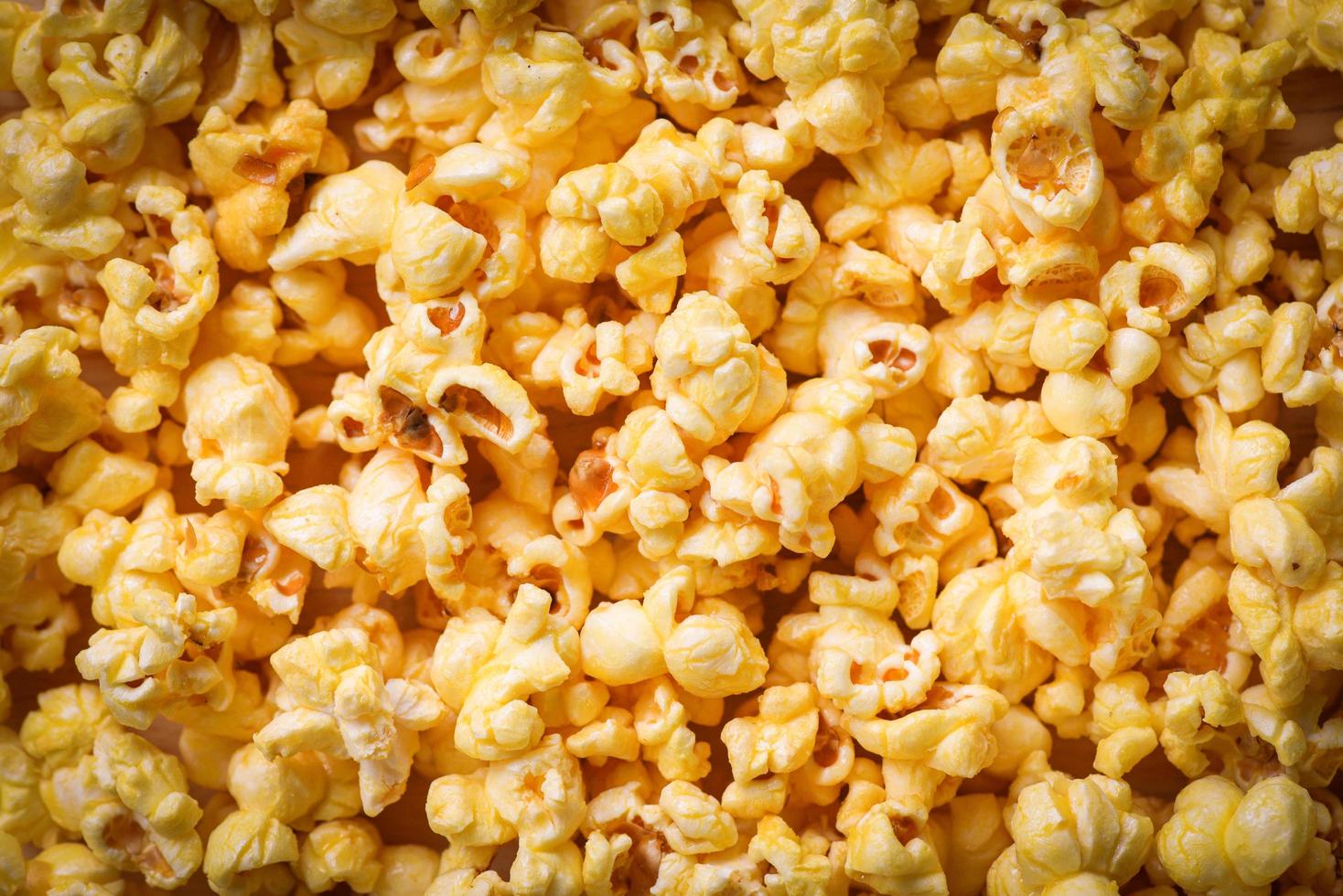 schließen oben Popcorn - - Süss Butter Popcorn Textur Hintergrund oben Aussicht foto