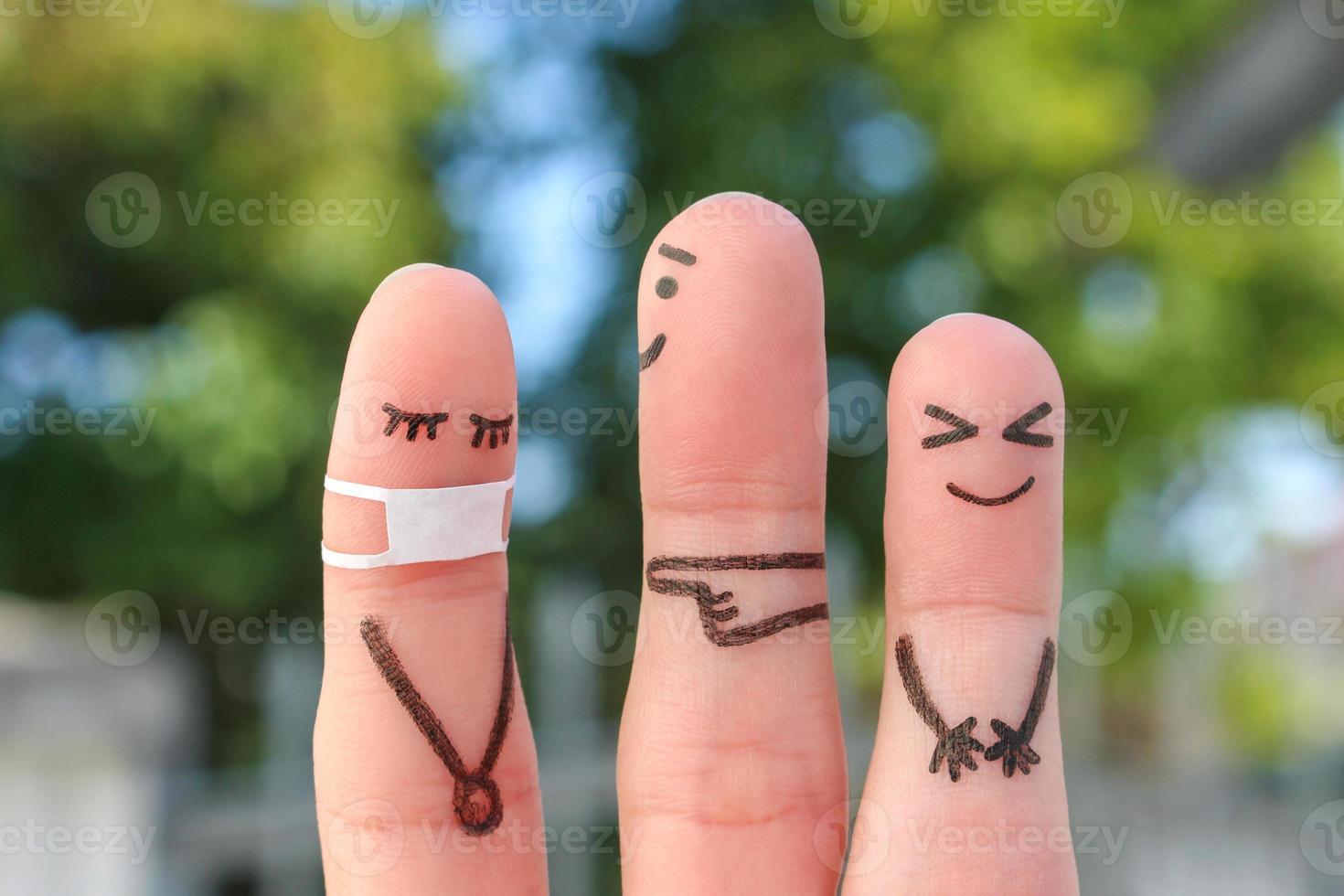 Finger Kunst von Personen. Konzept Kinder Tyrannisieren ihr Mitschüler im medizinisch Maske von covid-2019. foto