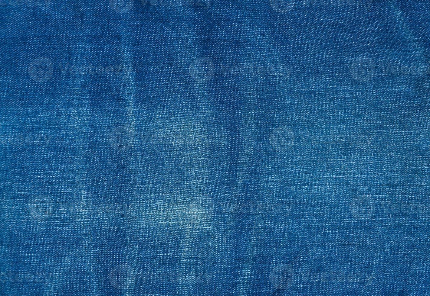 blauer Jeanshintergrund, blaue Denimjeansbeschaffenheit, Jeanshintergrund foto
