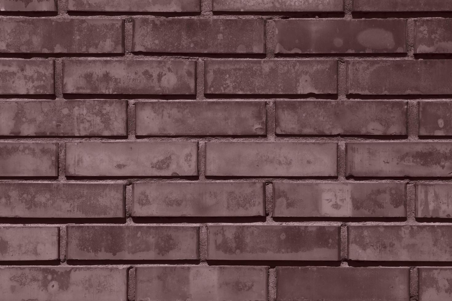 Backstein Mauer Hintergrund farbig im tief Taupe Farbe foto