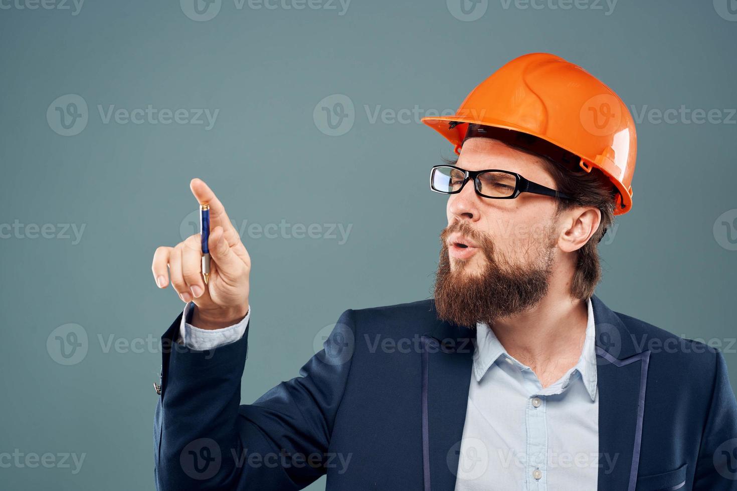 Mann im passen Orange Helm Fachmann Sicherheit Industrie Lebensstil foto