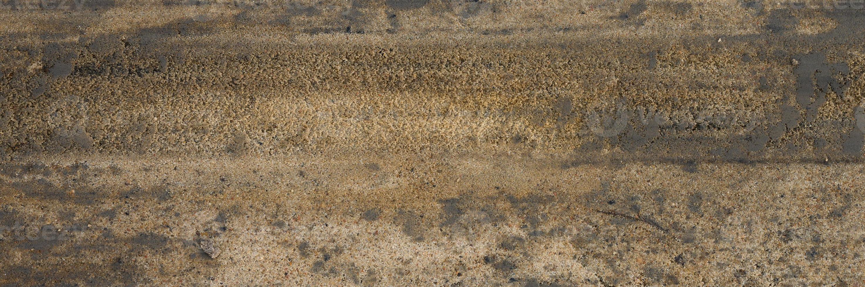Hintergrundtextur von der glatten Oberfläche des Holzsandes foto