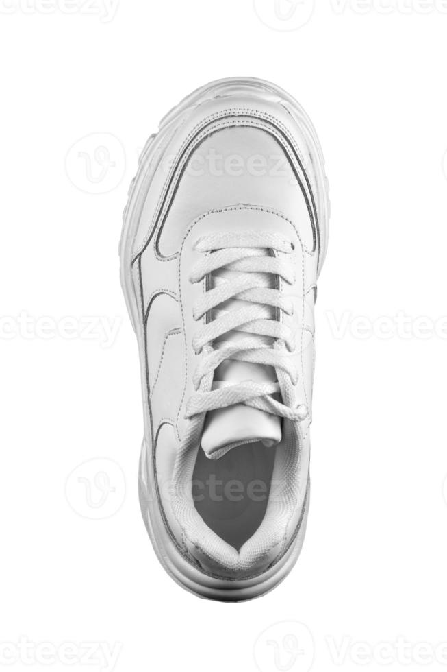 Weiß Sneaker oben Aussicht auf ein Weiß Hintergrund. Sport Schuhe. foto