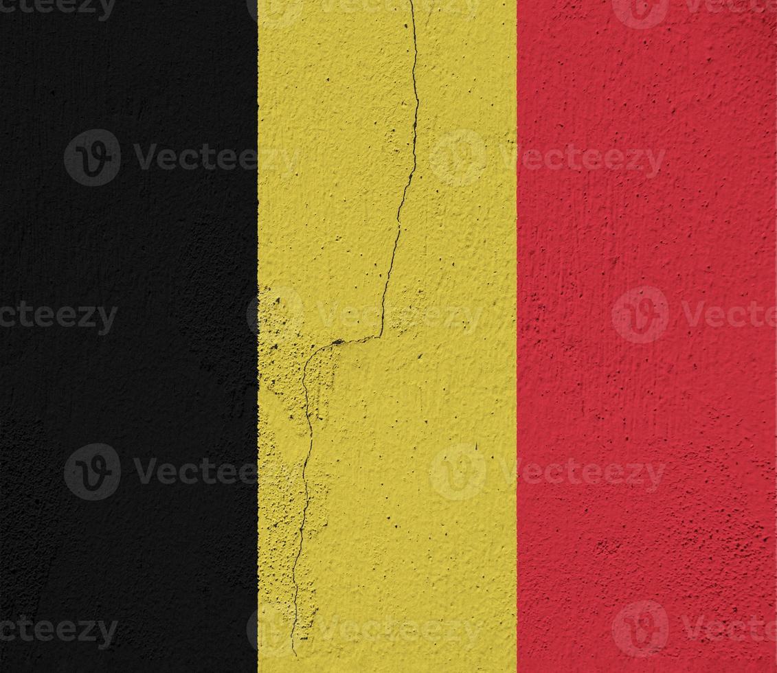 Flagge von Belgien auf ein texturiert Hintergrund. Konzept Collage. foto