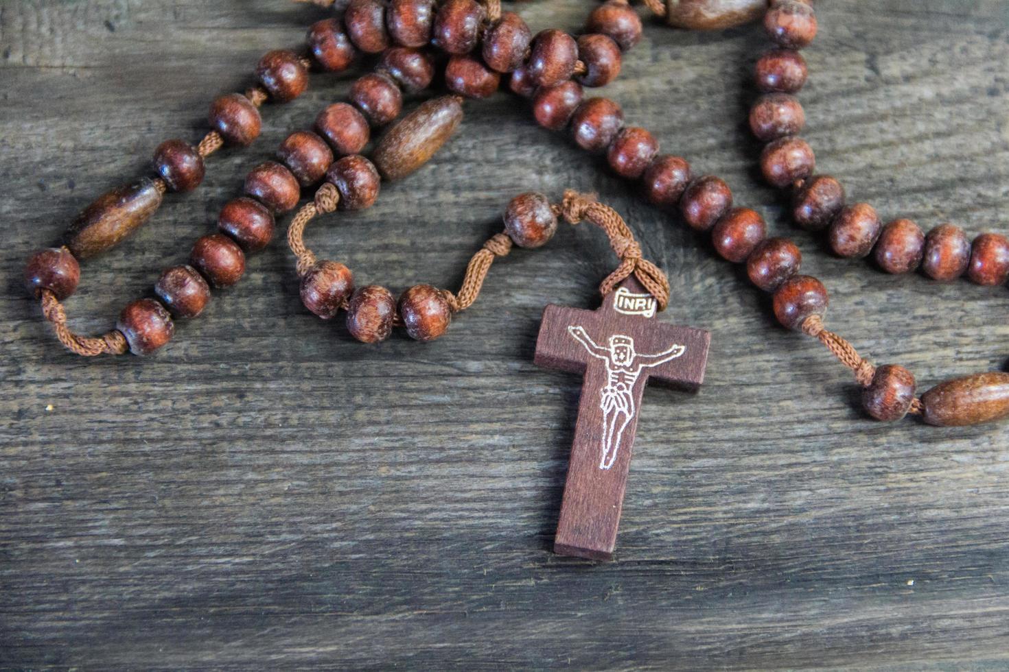 Detail von das Kreuz von ein katholisch Rosenkranz foto