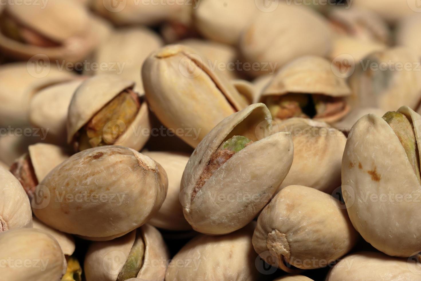 Pistazien Makro auf Textur Hintergrund. lecker Pistazien wie Hintergrund foto