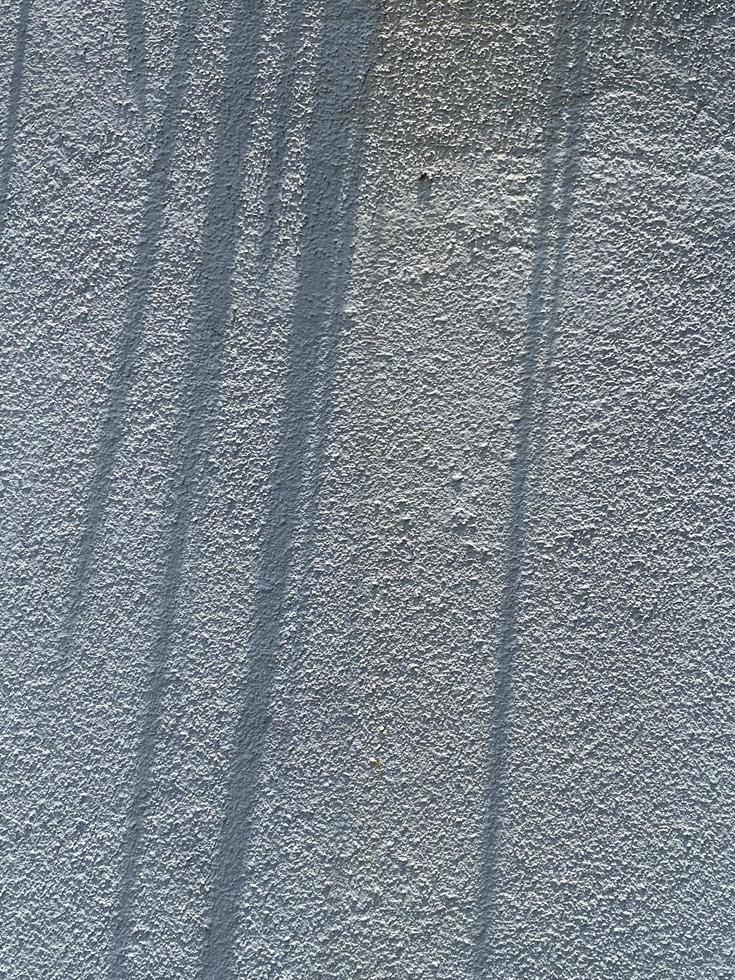 Blätter Schatten Hintergrund auf Beton Mauer Textur, Blätter Baum Geäst Schatten mit Sonnenlicht foto