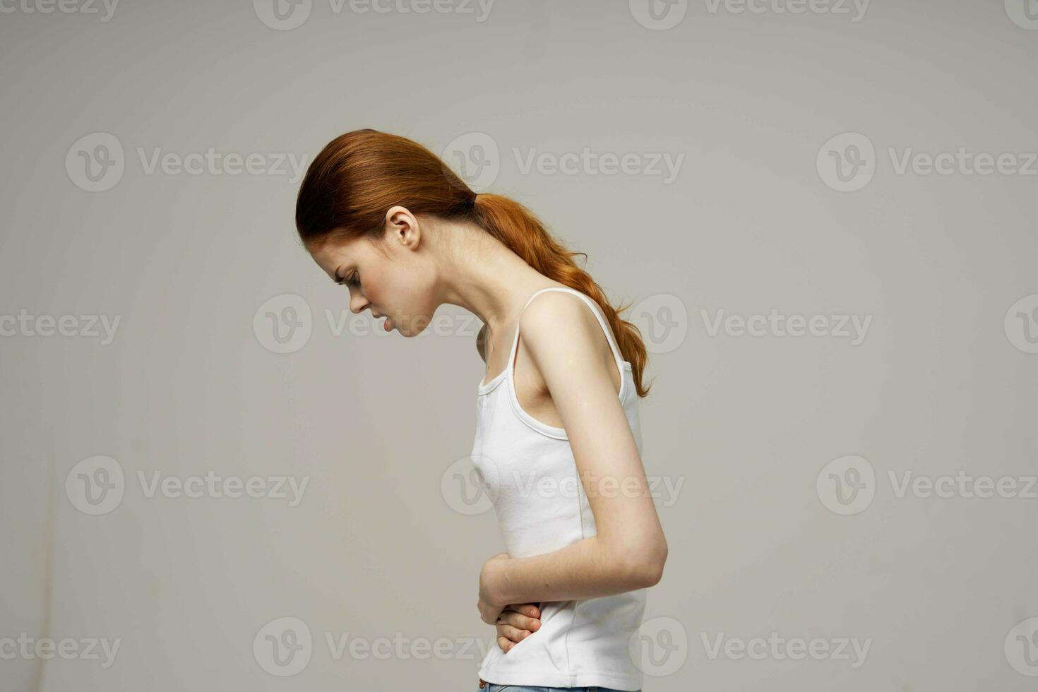 Frau Leiste Schmerzen intim Krankheit Gynäkologie Beschwerden Licht Hintergrund foto
