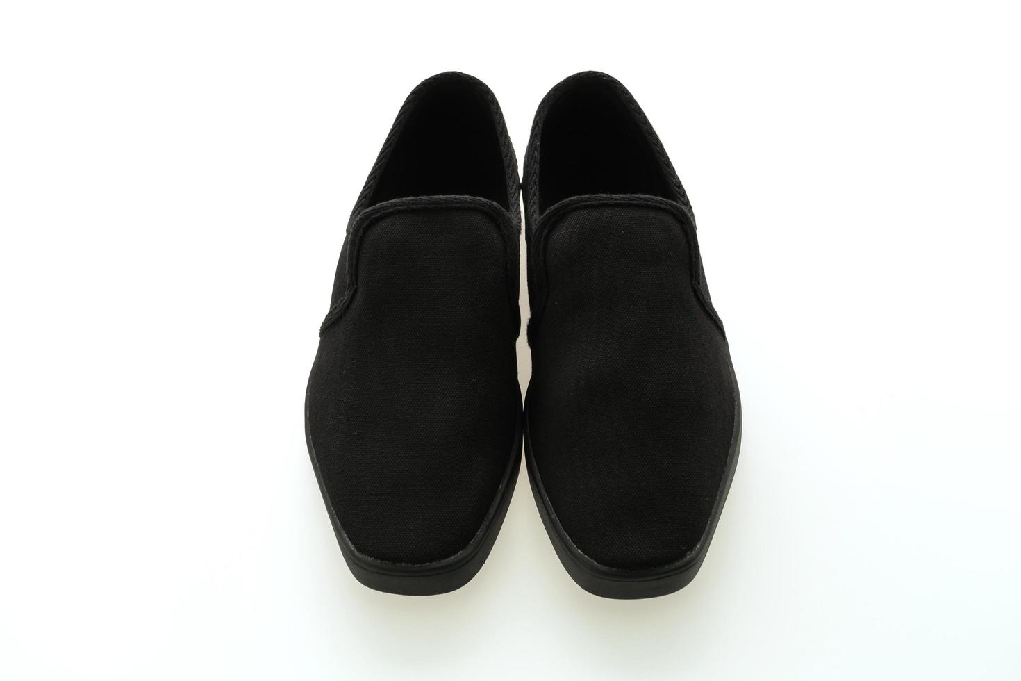 schwarze Schuhe auf weißem Hintergrund foto