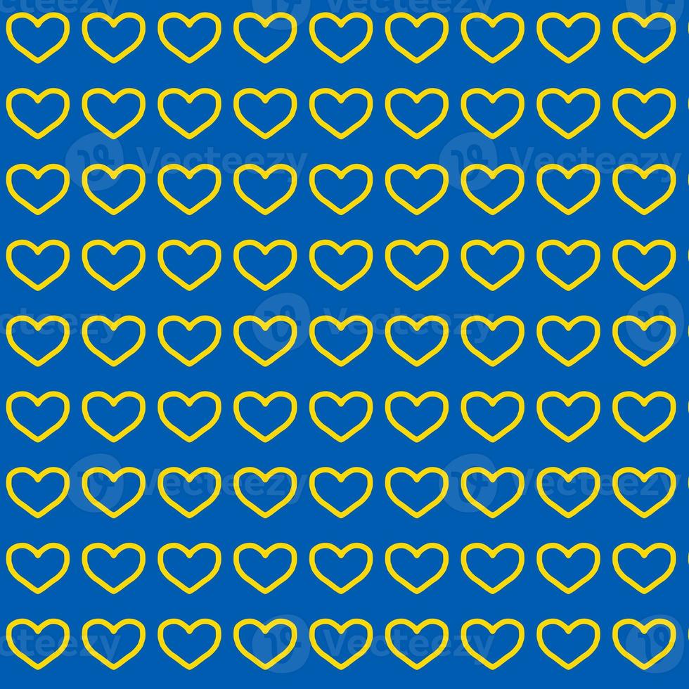 nahtlos Muster gemacht von Gelb Herzen auf Blau Hintergrund foto