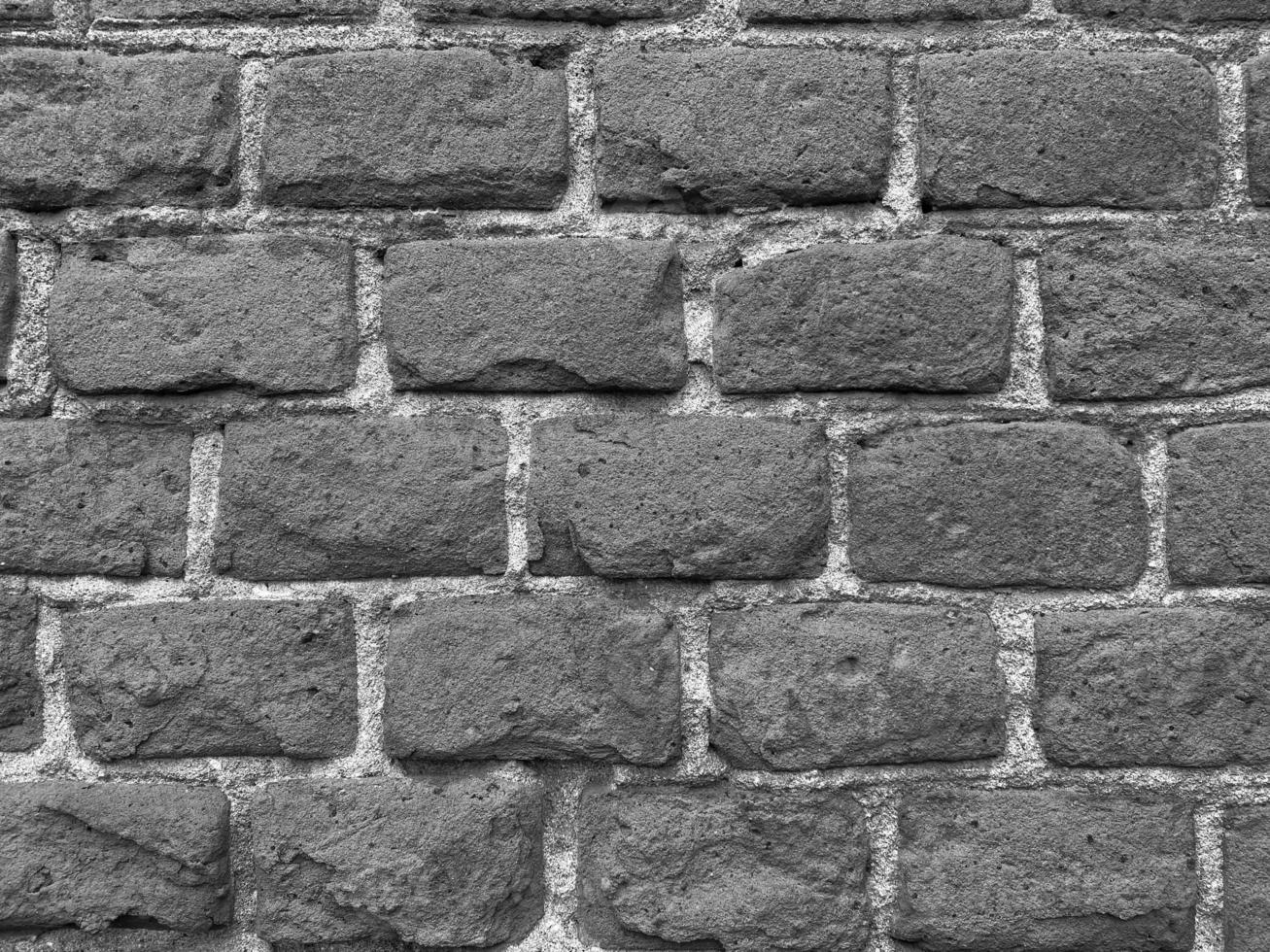 schwarz und Weiß Foto von Backstein Mauer