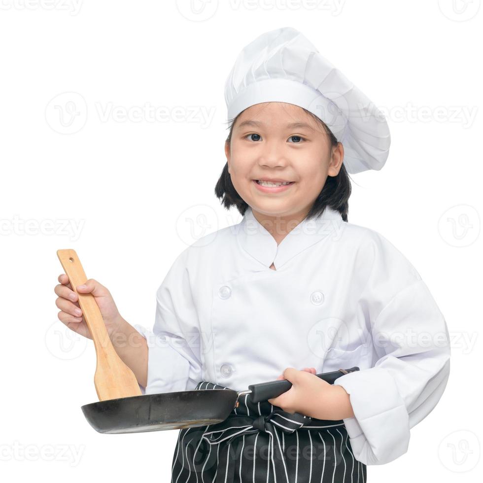 glücklich asiatisch Mädchen Koch halten Kochen Utensilien foto