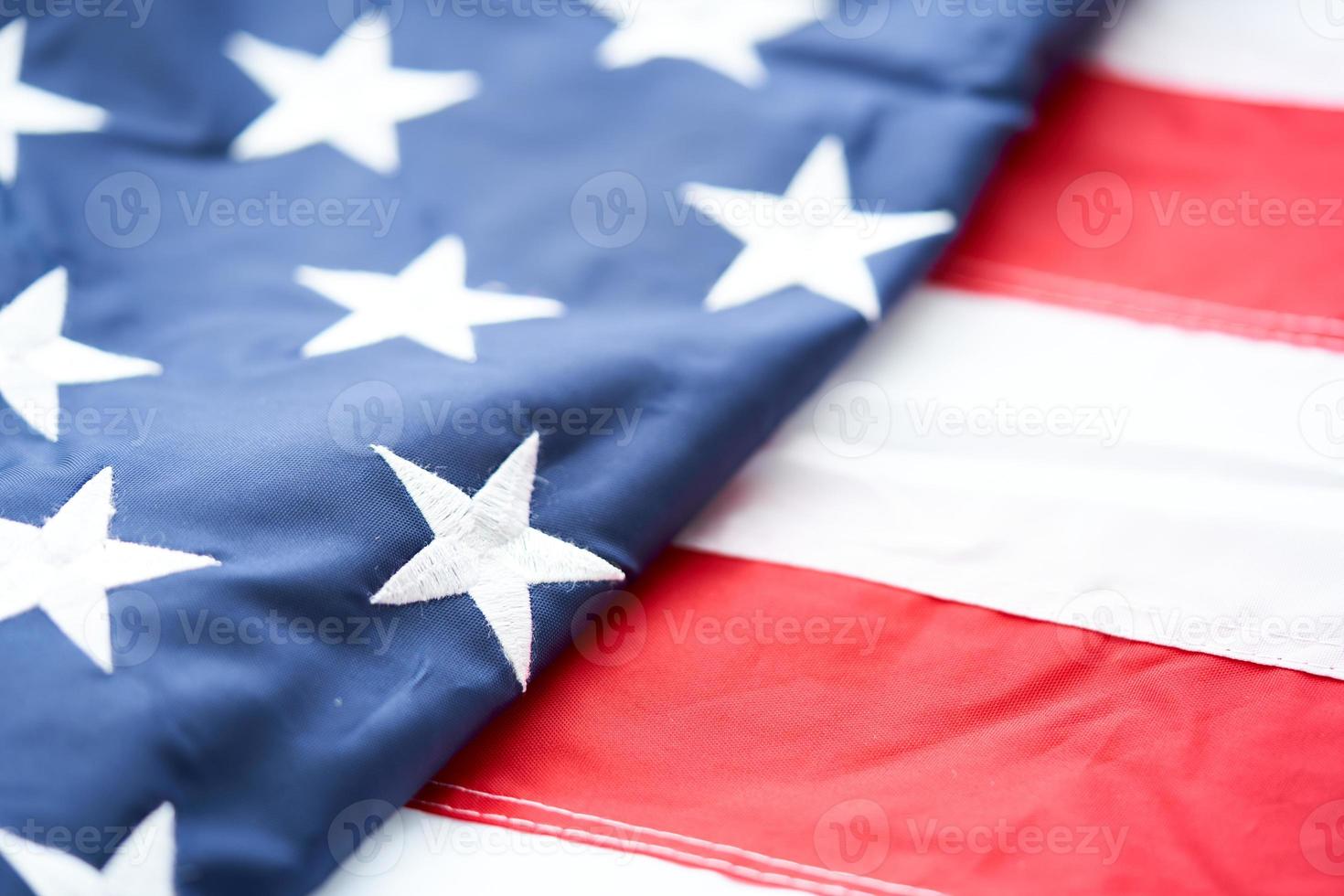 schließen oben USA amerikanisch Flagge Hintergrund. das Konzept zum Denkmal Unabhängigkeit oder Patriot Tag foto