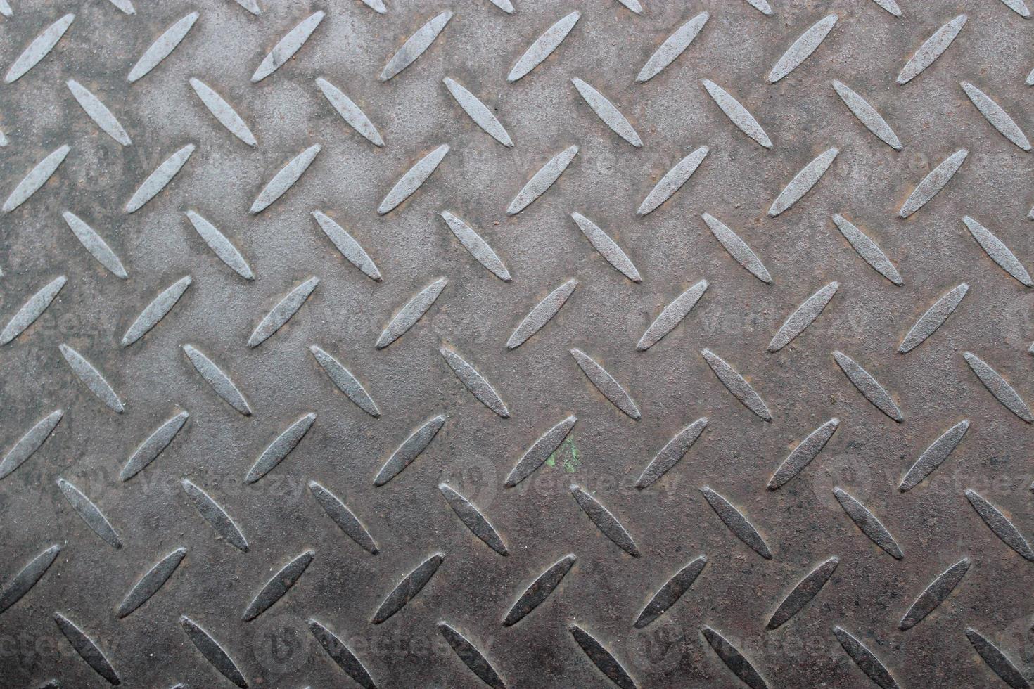 rostig alt Eisen Textur auf das Straßen foto