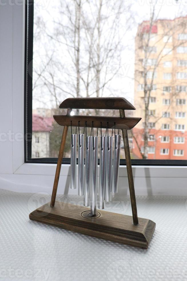 Foto Chinesisch Wind Glockenspiel auf Fensterbrett
