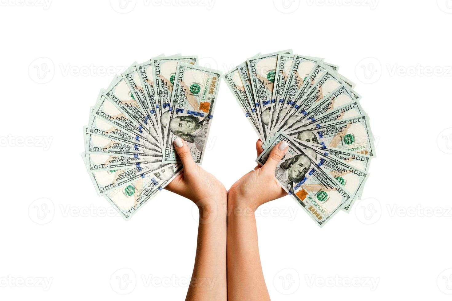 weiblich Hände halten ein Ventilator von Dollar Banknoten auf isoliert Hintergrund. Erfolg und Investition Konzept foto