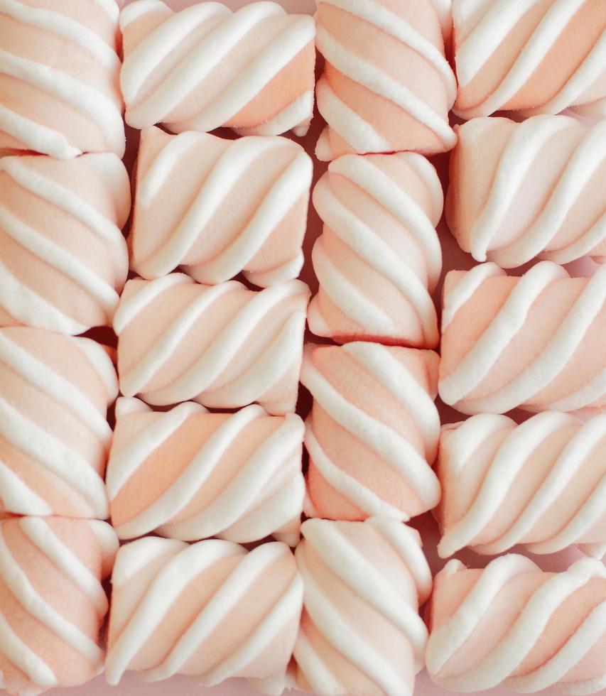 süße rosa Marshmallows mit weißen Streifen foto